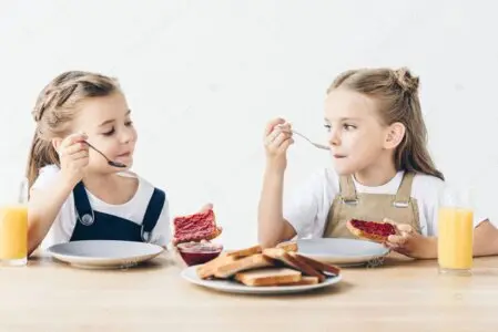 Healthy child-friendly meal with fruits and grains